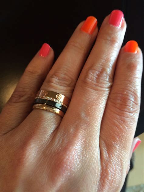 stacked cartier love rings